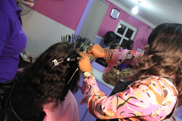 Getting her hair done by Celebrity Hair Stylist Nancy